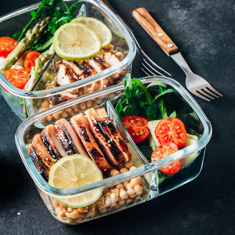 Simple meal prep containers with balanced protein, vegetables and carbs for a sustainable nutrition plan